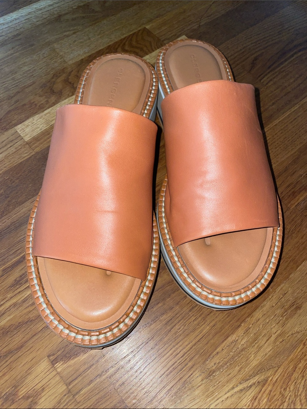 Robert Clergerie Leather Slide Sandals in saddle luggage brown.never worn